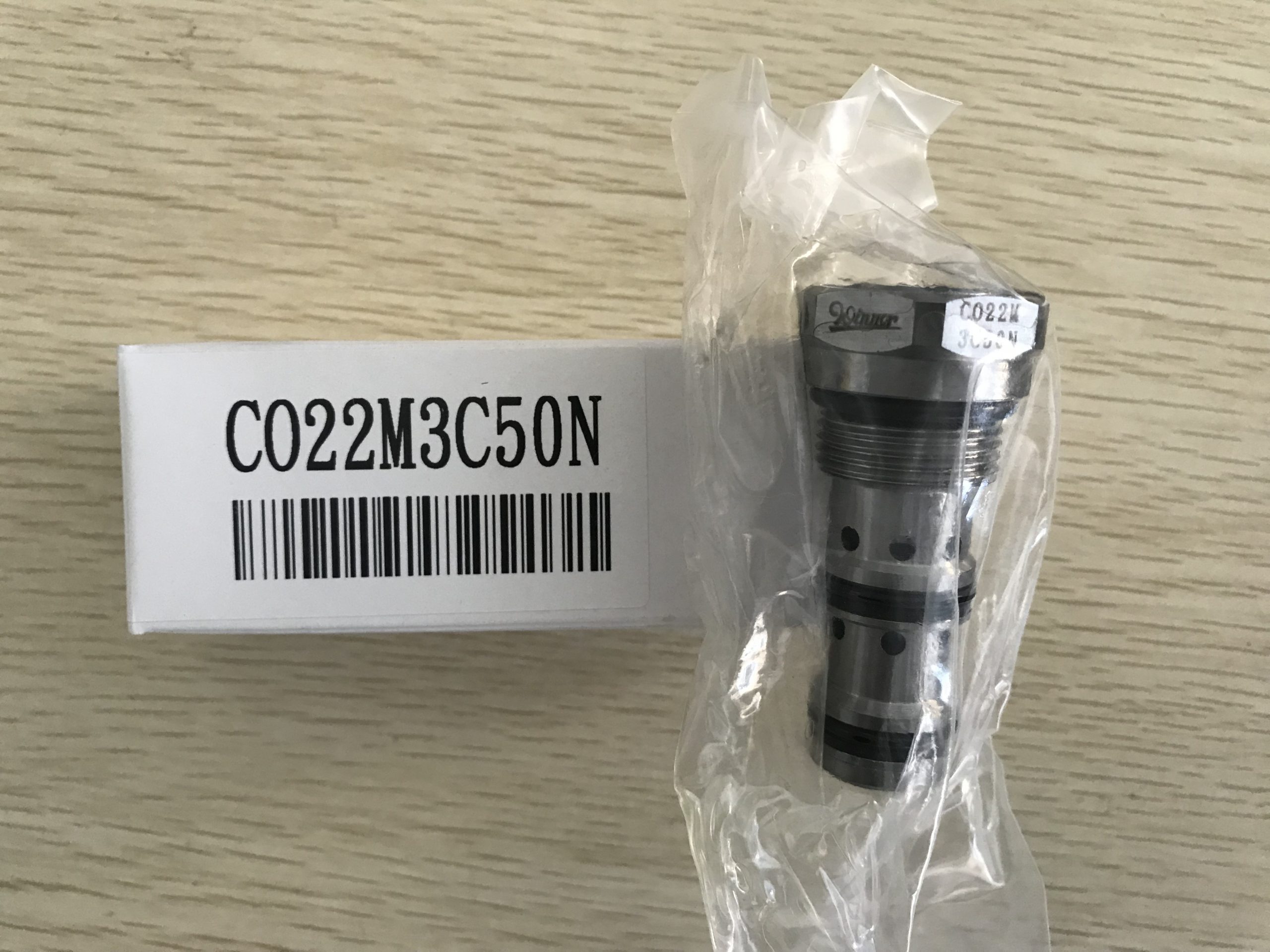 阀块集成设计中如何实现油路方向控制?盘龙插装式单向阀的作用解析配图